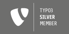TYPO3 Logo auf grau/silbernem Hintergrund mit Text "TYPO3 Silver Member"